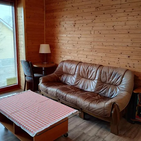 V Dřevěném Domě Apartamento